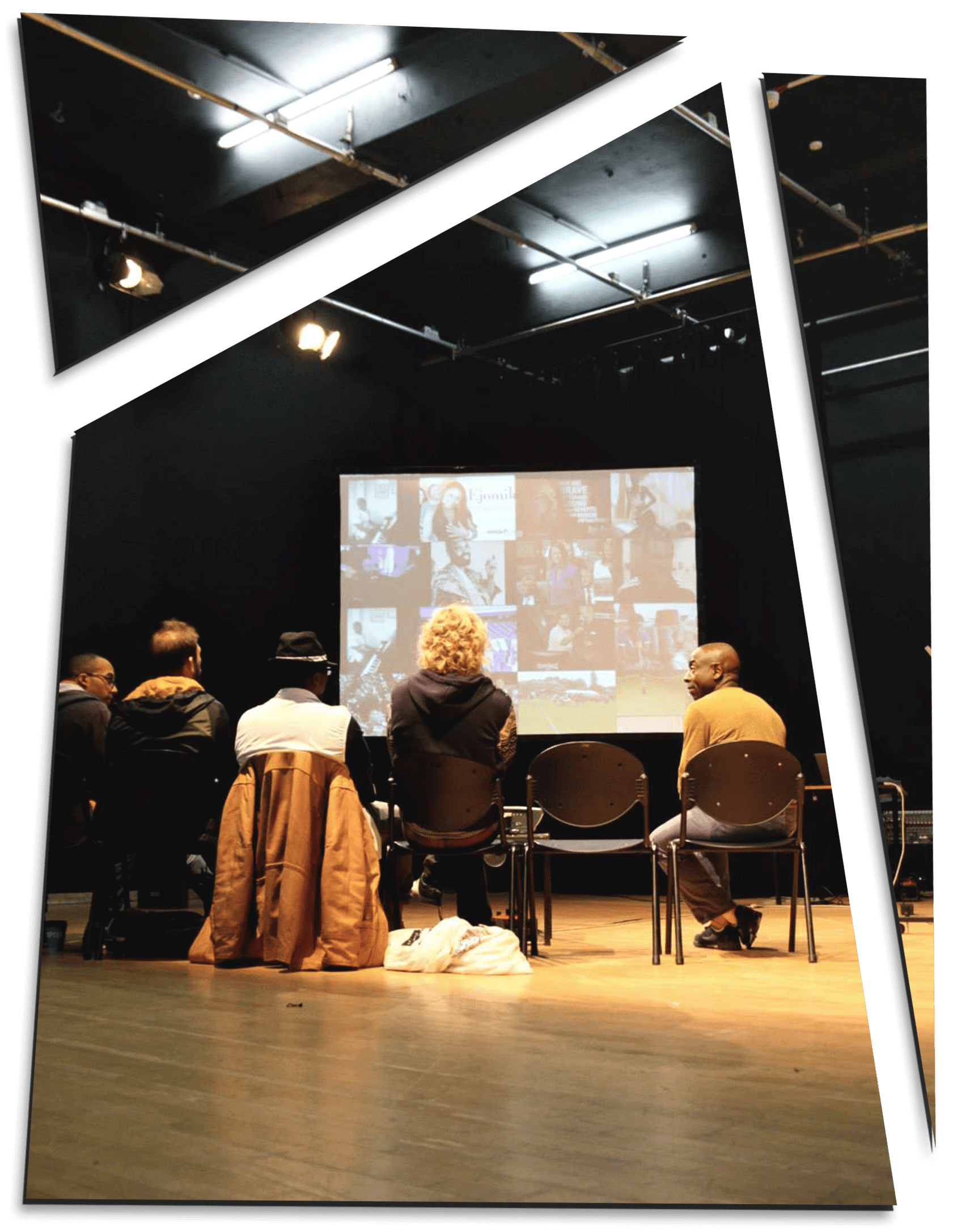 about (1) People seating watching projected images